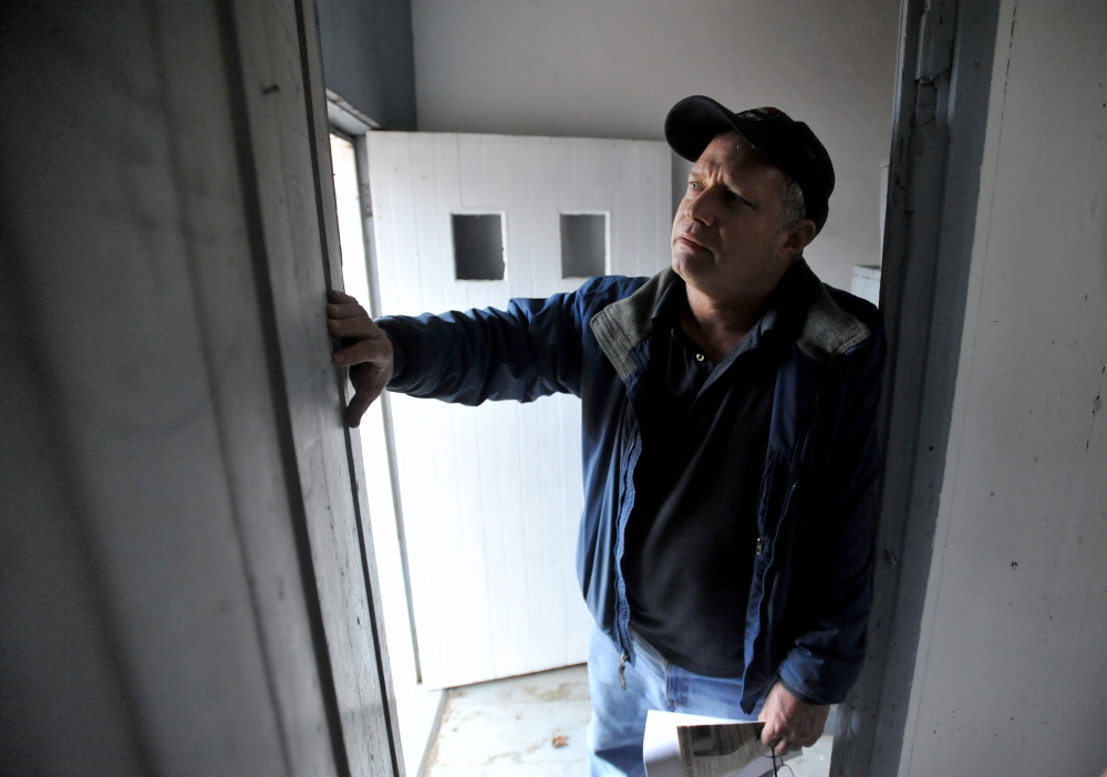 Winslow Councilman Raymond Caron, District 4, a former member of the now defunct Winslow Historical Society stands inside the historic Winslow schoolhouse on Wednesday.