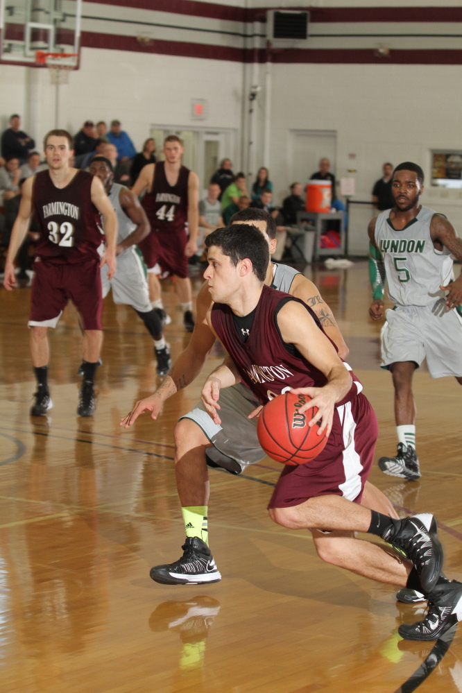 Contributed photo 
 University of Maine at Farmington guard Pet Sumner drives past a Lyndon State defender during a North Atlantic Conference game. Sumner is closing in on 1,000 career points.