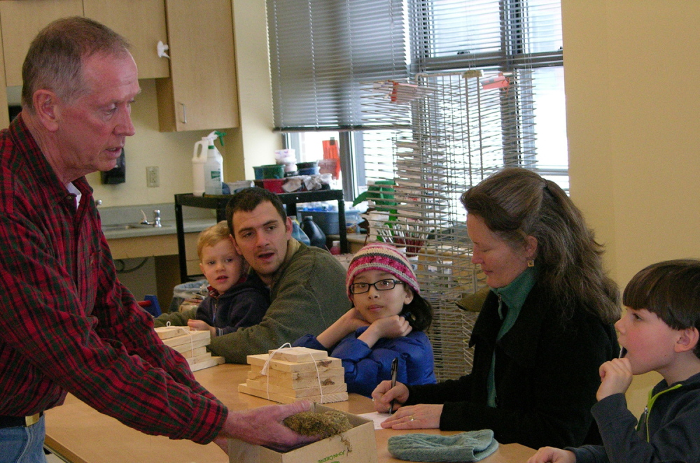 John Twomey, a volunteer and member of Sheepscot Wellspring Land Alliance, teaches a workshop about helping bird friends.