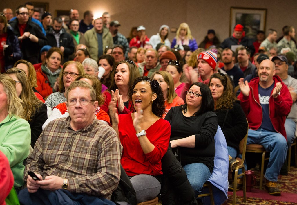 FairPoint employees listen to details of a tentative contract at the Fireside Inn.