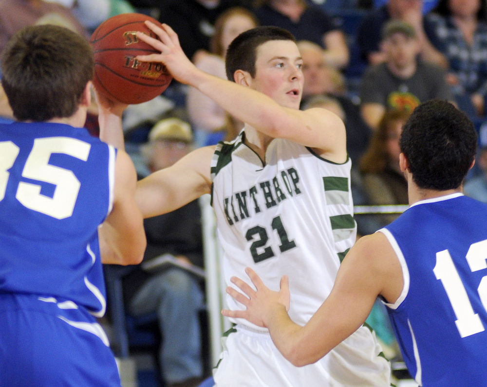 Winthrop High School’s Matt Sekerak looks for an opening during a tournament match up against Madison Memorial High School in Augusta on Monday.