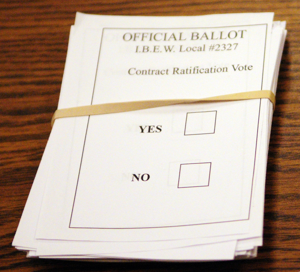 Ballots sit on a table before a meeting in Augusta Sunday at which FairPoint workers ratified a new contract.