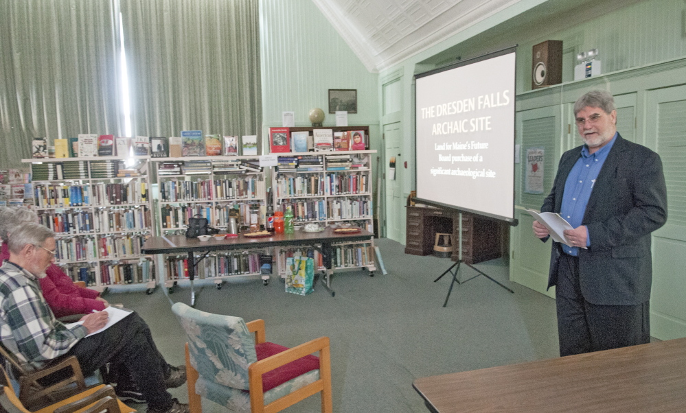 Arthur Spiess, an archeologist with the Maine Historic Preservation Commission, talks about the Dresden Falls Archaic Site during a meeting of the Dresden Historical Society at Bridge Academy Public Library in Dresden on Sunday.