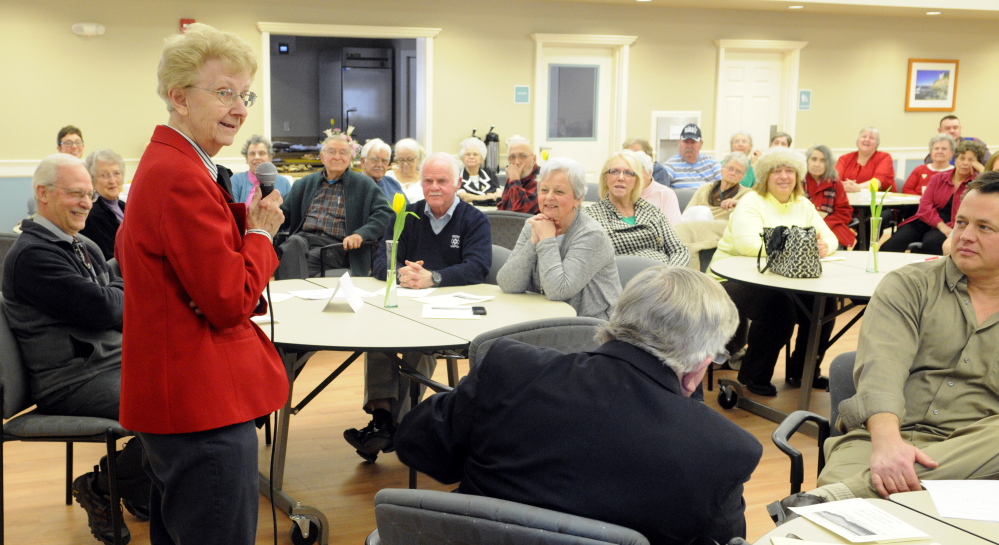 Fran Wood, resident committee chairwoman, speaks during the Arch Beta community center dedication ceremony on Tuesday in Augusta.