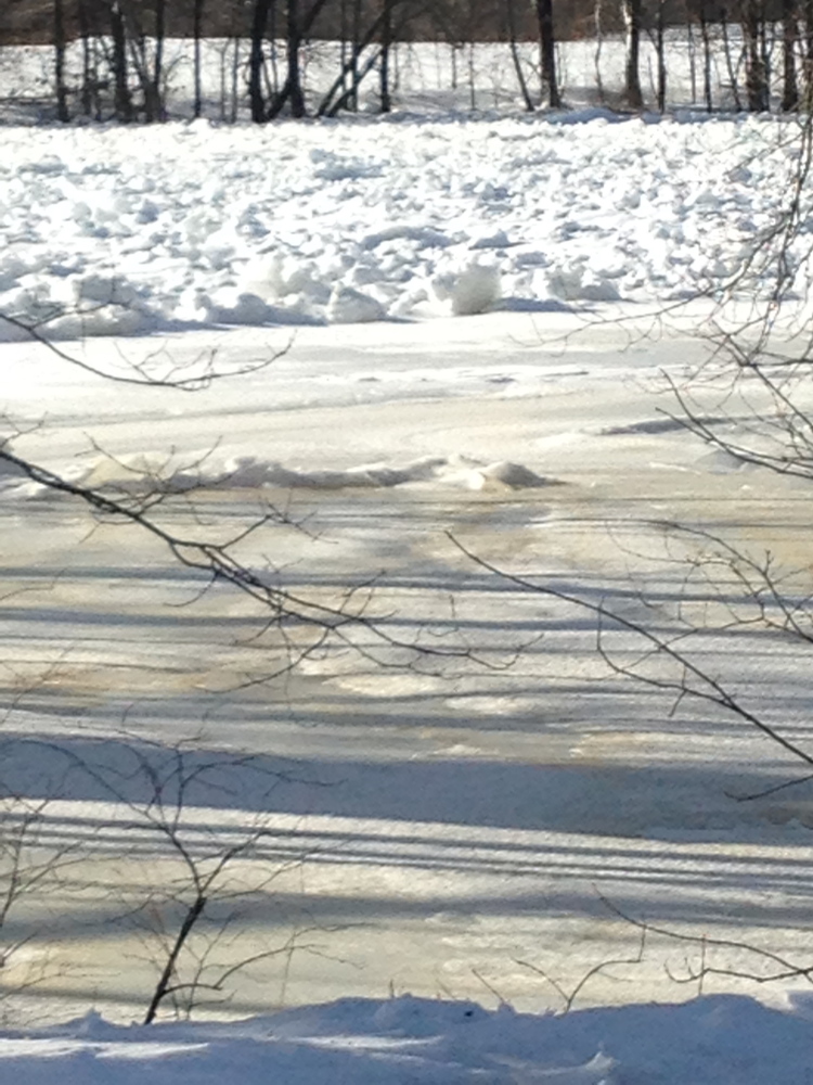 An ice jam on the Kennebec River in Madison, seen in a Jan. 28 photo, has experts worried that a rapid melting of snow might combine with the ice jams to cause spring flooding.