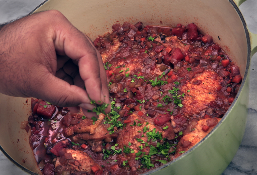 Chicken braised with pancetta and tomatoes is a flavorful version of poultry in a pot.