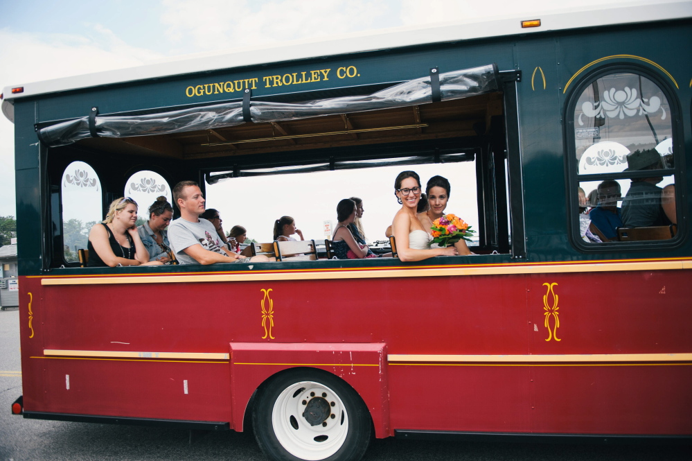 Jessica and Michelle Newton of Newton, Mass., ride a trolley back into downtown Ogunquit for dinner after they eloped together on a sailboat. “(The town is) such a welcoming, friendly, down-to-earth place,” Jessica Newton said.