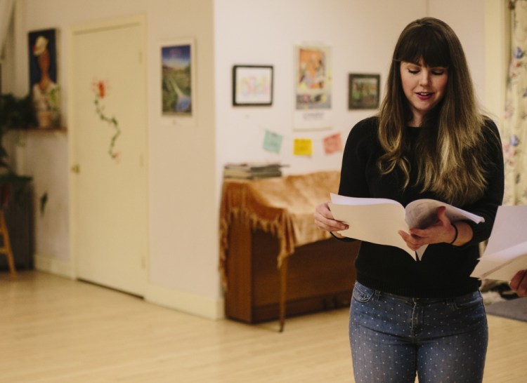 Kacy Woodworth looks over her lines before rehearsing her part in “The Maine Dish: A Feast of Plays About Food,” which will be performed March 5-8 at the Portland Ballet Studio Theater.