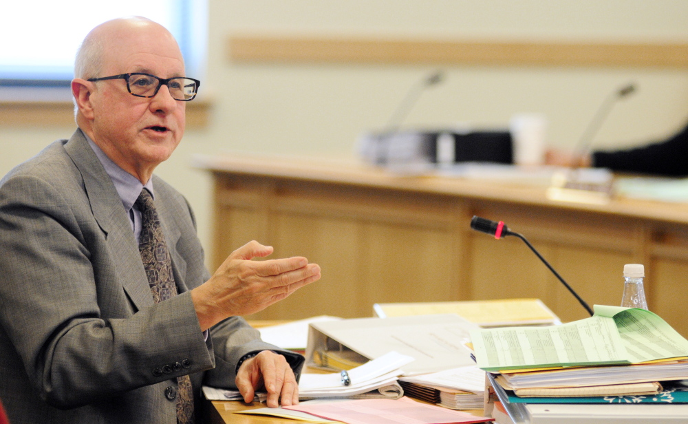 Riverview Psychiatric Center Superintendent Jay Harper answers questions during a work session of the Legislature’s Health and Human Services Committee on Tuesday. Harper acknowledged that, to meet minimum staffing levels, mandatory overtime has risen sharply, but said he’s working on reforms that will help ease staffing shortages.