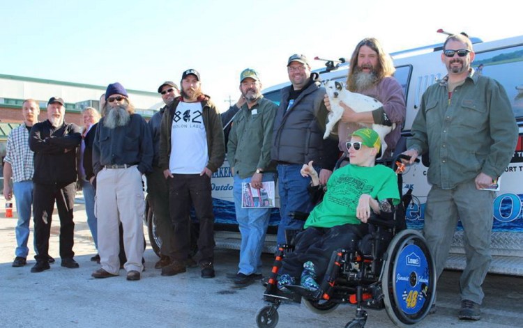 Tony Bennett, in long beard holding his dog Duke, gathered with other cast members and fans at a “Bring Back Down East Dickering” event at Dysart’s restaurant in Bangor in March.