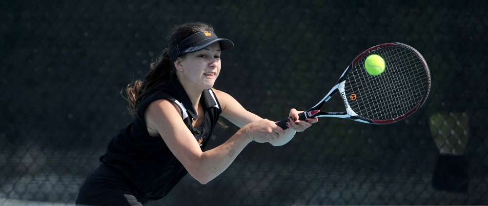 Skowhegan Area High School’s Vasilisa Mitskevich competes against Greely High School’s Izzy Evans on Saturday at Colby College.