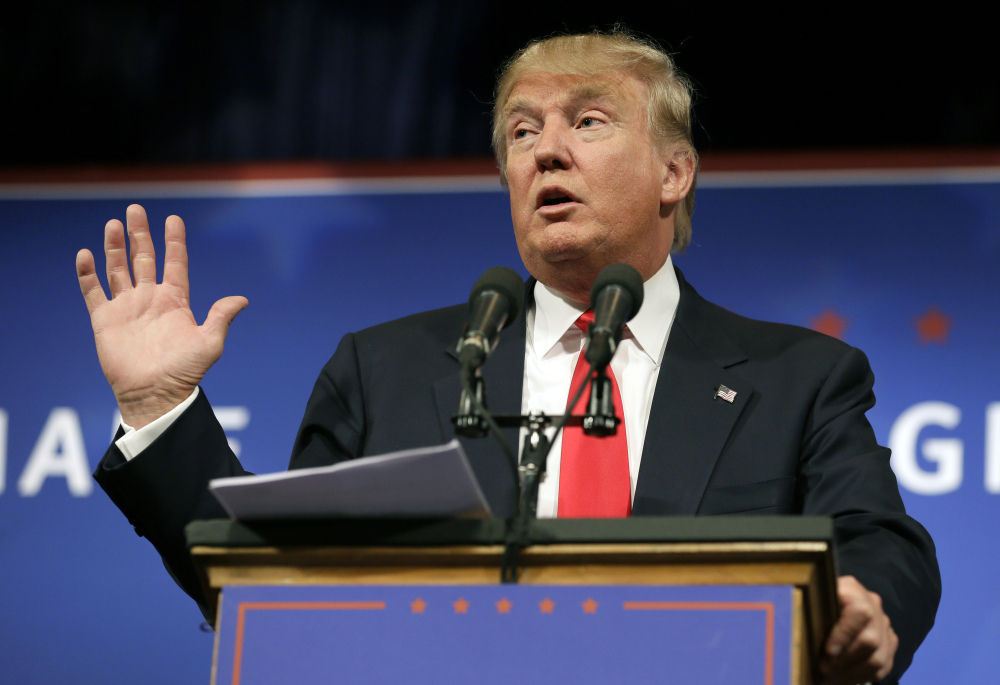 In this Tuesday, June 16, 2015, file photo, Republican presidential candidate Donald Trump speaks to supporters during a rally, in Des Moines, Iowa.