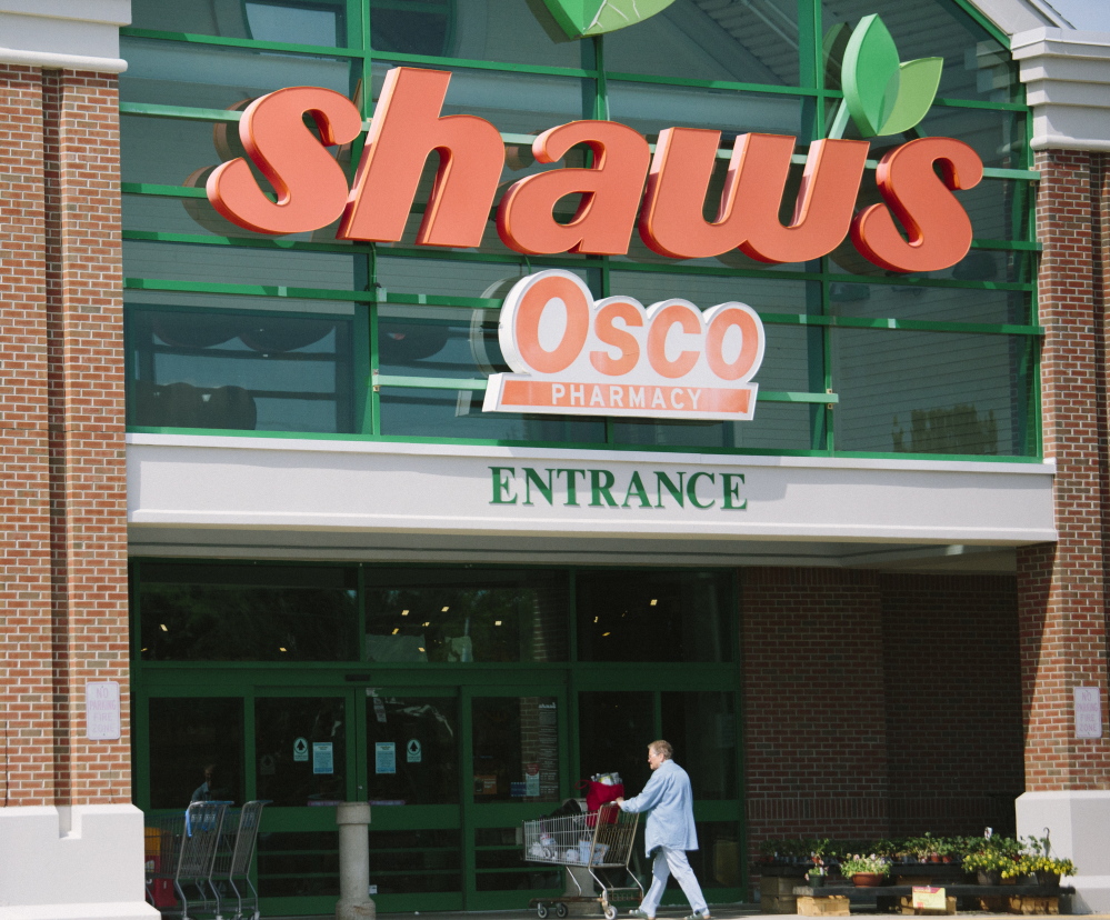 Linda Rhuda walks into the Biddeford Shaw’s, which will close its doors July 4. The store’s 90 employees were informed of the closing Tuesday.