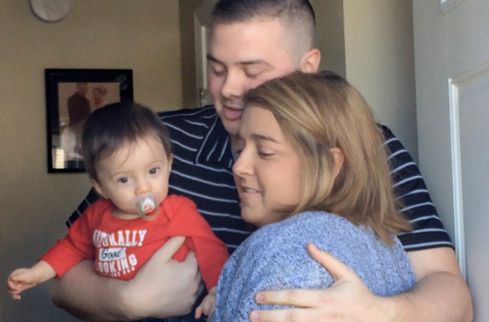 Holding his son, Josh Dall-Leighton hugs Christine Royles at his home in Windham March 24 when they first met. He is set to donate a kidney to Royles next week.
2015 Press Herald file/Susan Kimball