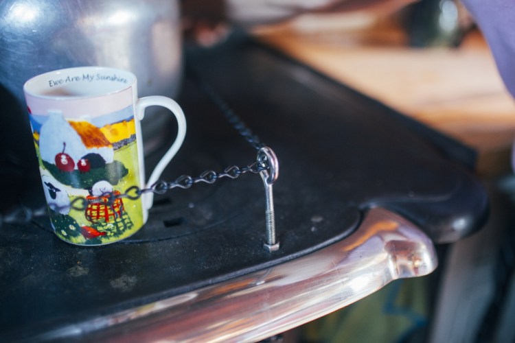 This chain around the oven helps prevent pots and pans from sliding off. 
Whitney Hayward/Staff Photographer