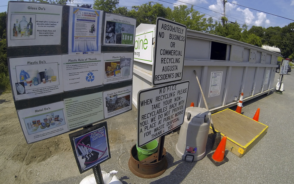 The outside of a recycling container is seen Tuesday at the John Charest Public Works Facility on North Street in Augusta.