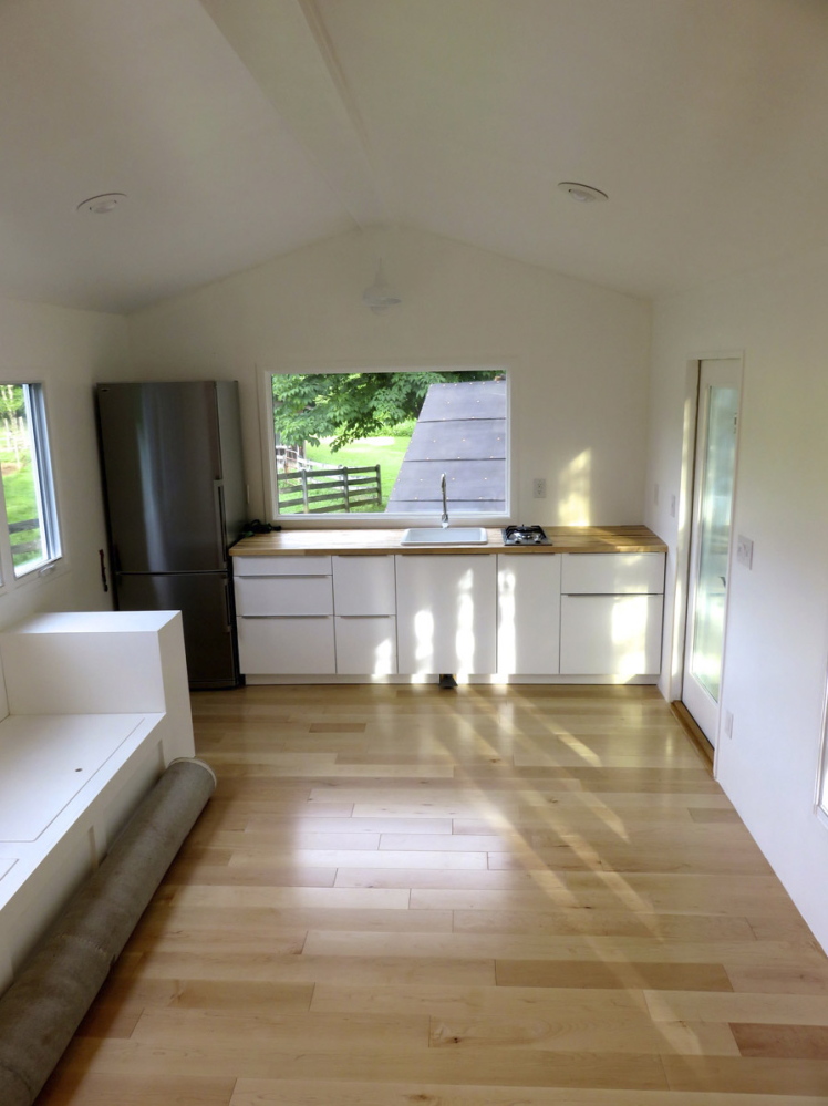 The kitchen area in the Reens' one-room house, photographed from the office across the room.