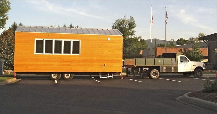 Tommy and Dewey Reen's tiny house sits on a trailer. In January they began posting ads on Craigslist seeking a property owner willing to let them park it on a piece of land.