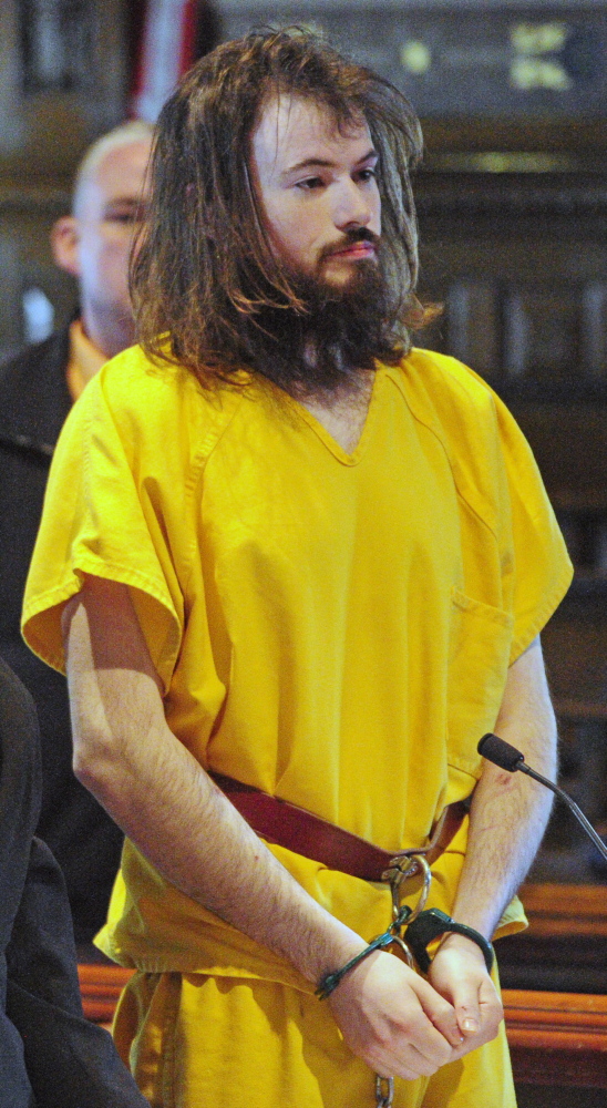 Leroy H. Smith III listens to proceedings during his initial appearance in Kennebec County Superior Court in this May 2014 file photo.