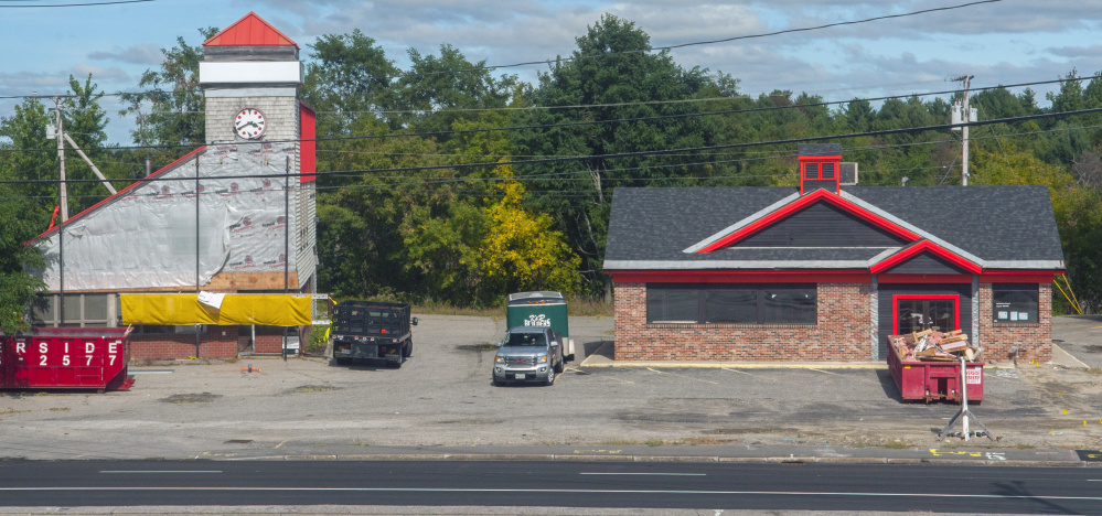 Two neighboring Western Avenue buildings are under renovation. The one on the left is scheduled to become the new Kennebec Valley Chamber of Commerce office, and the one on the right will be a pizza shop.