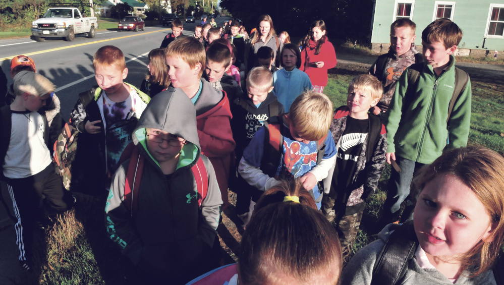 Solon Elementary School students make their way to school on Main Street on Tuesday as they took part in the Walking School Bus. The school has a Walking School Bus about four times a year.