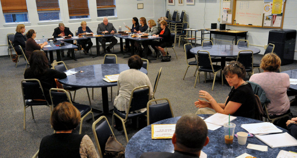 The Waterville school board calls the meeting to session at Waterville Senior High School Wednesday. The board later met in executive session to hear Superintendent Eric Haley’s recommenation on principal Don Reiter, who has been on paid administrative leave since Sept. 1.