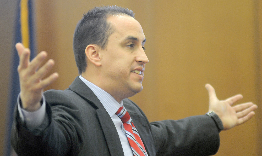 Defense attorney Darrick Banda makes closing arguments Wednesday during the trial of Roland J. Cummings in Augusta. Defense attorney Darrick Banda makes closing arguments Wednesday during the trial of Roland J. Cummings in Augusta.