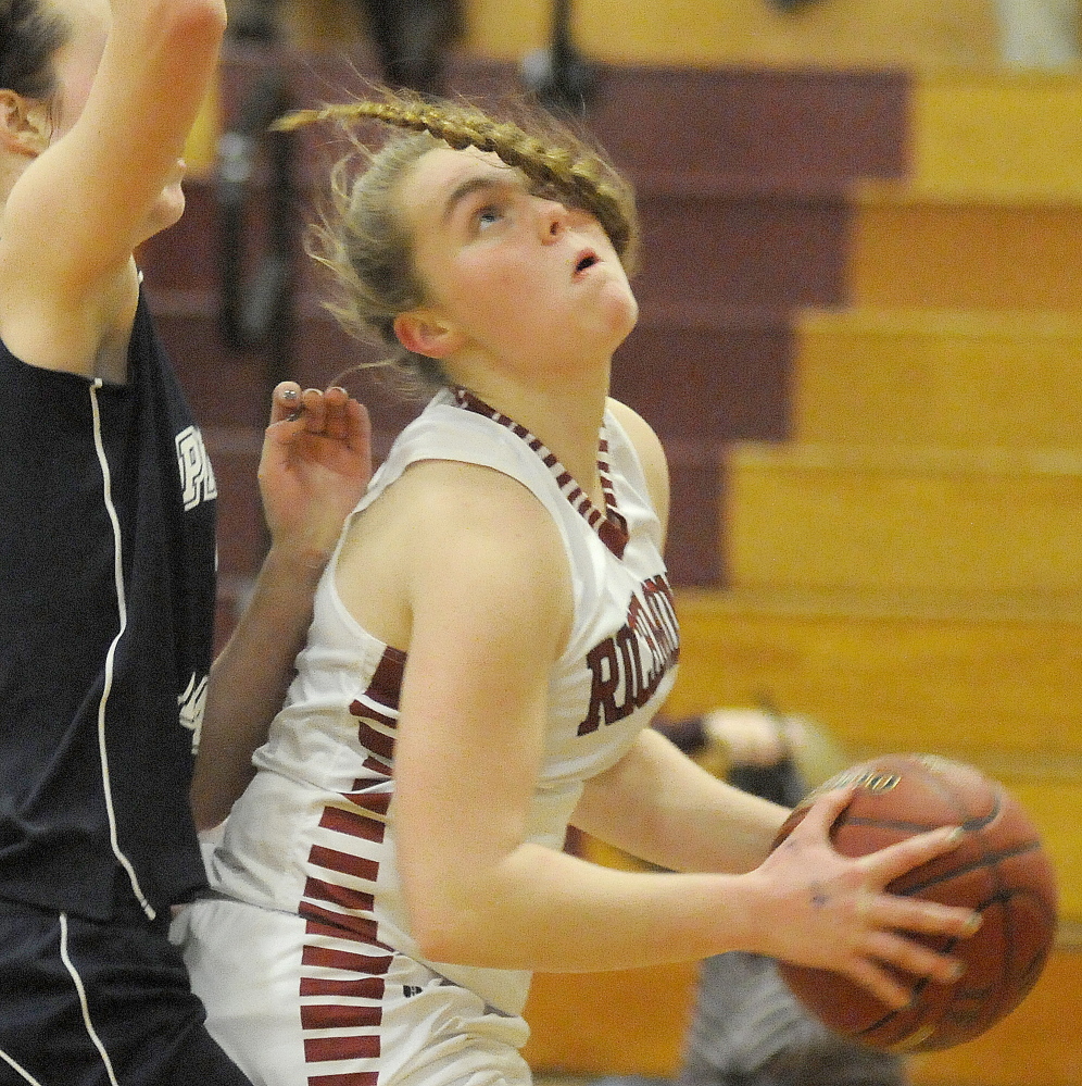 Richmond’s Sydney Tilton looks for a shot during a game against Pine Tree Academy last season. Tilton helped the Bobcats earn their first win over Rangeley in about three years.