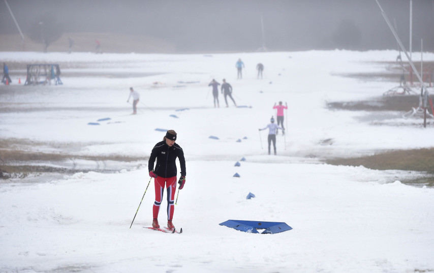 The high school ski season has been stalled due to a lack of snow, as seen in this photo last week at the Quarry Road Recreational Area in Waterville.