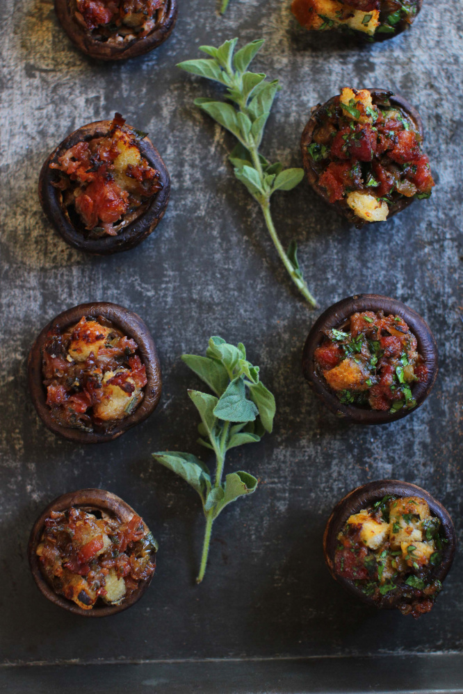 Italian-style stuffed mushrooms, left, and Spanish-style.