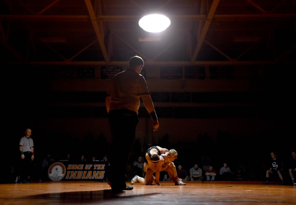 Skowhegan Area High School’s Julian Sirois, top, wrestles Messalonskee’s Austin Pelletier in the 154-pound bout in Skowhegan earlier this season. Both wrestlers are poised for strong showings at the Kennebec Valley Athletic Conference championships Saturday at Cony.