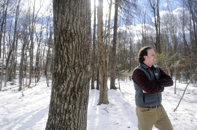 Kennebec Land Trust stewardship director Jean-Luc Theriault walks Wednesday the new 72 acre parcel in Winthrop the non-profit recently acquired in the Mount Pisgah conservancy.