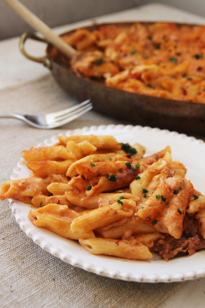 if you don't precook the pasta and instead add it dry to the sauce for baking, it will take much longer to become tender in the oven. 

The Associated Press