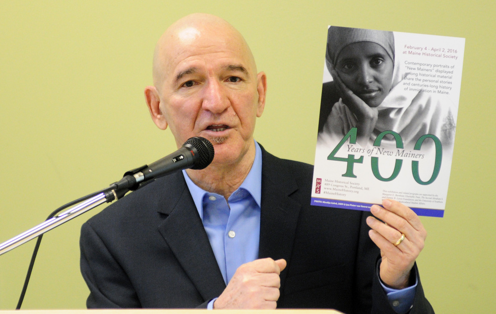 Reza Jalali, coordinator of multicultural student affairs at the University of Southern Maine, speaks on Friday at Michael Klahr Center in Augusta.