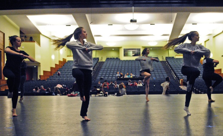 A dance group performs during a rehearsal for the 125th Chizzle Wizzle last week at Cony High School in Augusta.