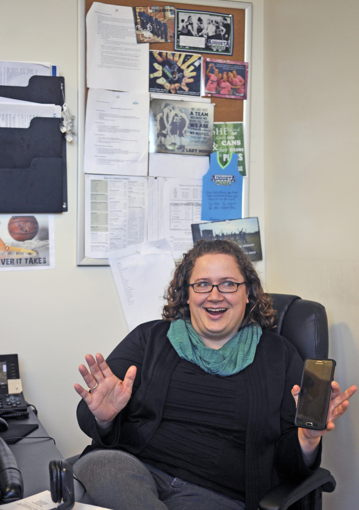 Staff photo by Joe Phelan
Laurie Ficker, of South China, is a self-described basketball junkie. She says she enters multiple men’s and women’s pools for fun.