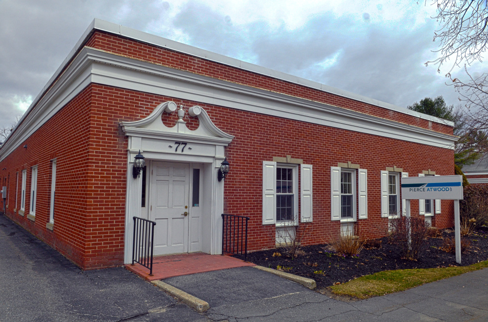 Kennebec County officials closed Thursday on the purchase of 77 Winthrop St. in Augusta to house the Registry of Deeds.