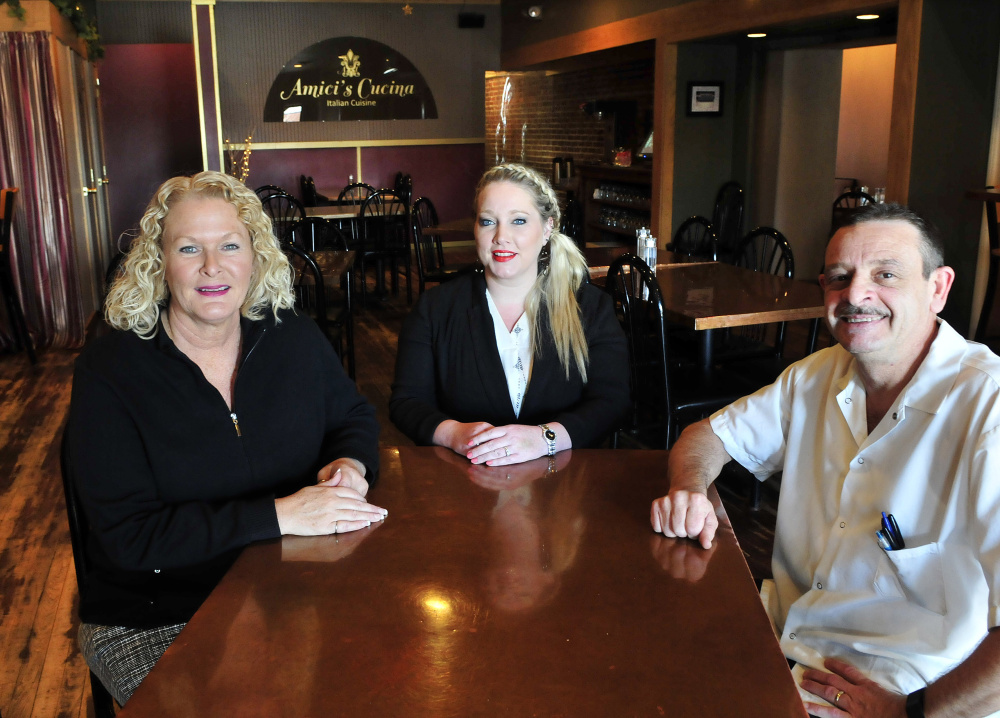 Downtown Waterville restaurant Amici's Cucina has been named Business of the Year by the Mid-Maine Chamber of Commerce. From left are owners Mary Carpinito, Shannon Mitchell and Angelo Carpinito.