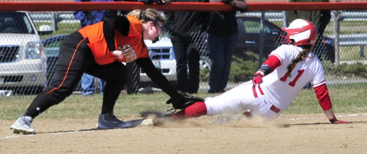 Skowhegan's Bonnie-Jane Aiken makes the tag on Cony's Skylar Watson at third base Wednesday in Skowhegan.