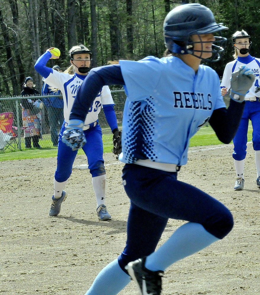 Madison pitcher Madeline Wood throws prepares to throw to first to retire Telstar's Haley Peterson during a Mountain Valley Conference game Monday in Madison. The Bulldogs won 3-1.