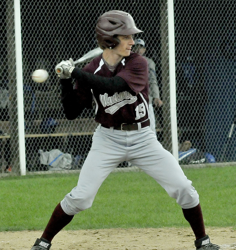 Monmouth's Chandler Harris lets a foul ball go by against Madison on Monday in Madison.