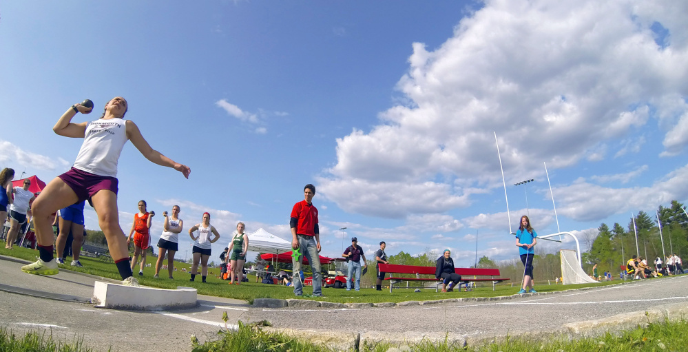 Monmouth Academy's Mahala Hayden throws the shot during a meet Friday at Alumni Field in Augusta.