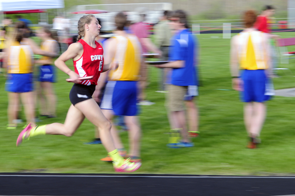 Cony's Anne Guadalupi runs the anchor leg for the 4x800 meter relay team during the annual Capital City Classic in Augusta last month.