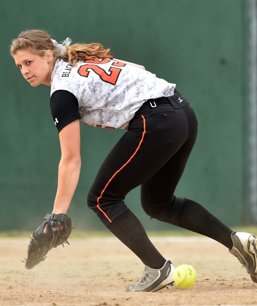 Winslow pitcher Hillary Libby tries to make the play on a ground ball up the middle during a Class B North playoff game last Thursday against visiting Ellsworth High School.