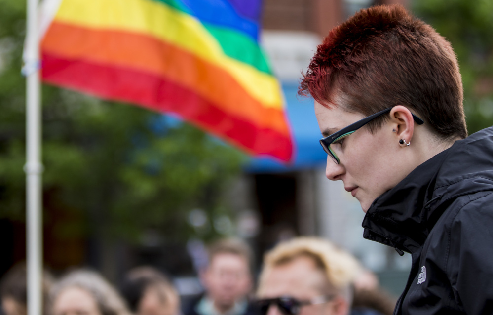 Skyler Keiter of South Portland spoke about the mass shooting in Orlando during Sunday's vigil in Monument Square in Portland. Other vigils were scheduled around the state Monday.