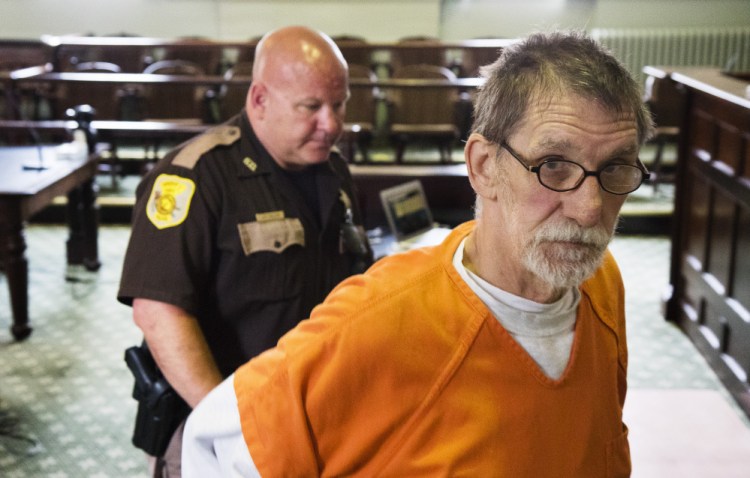 Frank D. Fournier, convicted of murdering a man in Portland in 1987, leaves Lincoln County Superior Court after his resentencing hearing Tuesday. His attorney, Verne Paradie, said Fournier is "very thankful that the court and the state did the right thing here."