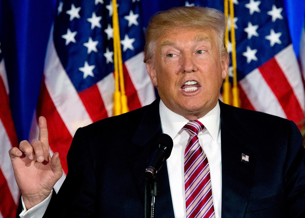 Donald Trump, joined by his wife, Melania, speaks at a news conference Tuesday night at the Trump National Golf Club Westchester in New York. He said he understands "the responsibility" of being the Republican presidential nominee.
Associated Press/Mary Altaffer