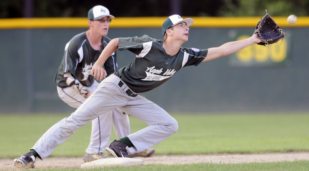 Apple Valley's Greg Fay can't grab an errant throw to second during the 13-15 Babe Ruth state championship game Monday night in Augusta.