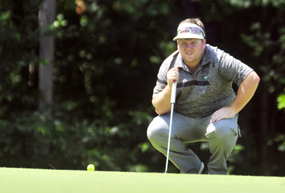 Ryan Gay lines up a putt during the Charlie's Open last summer at the Augusta Country Club. (Staff file photo)