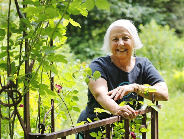 Andy Burt, a longtime social/environmental justice activist, poses for a portrait at her home. 